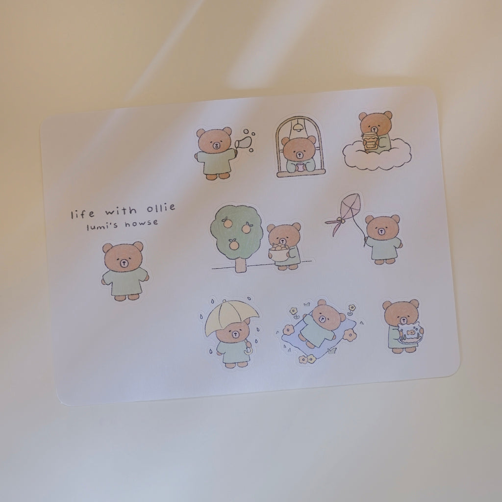 Sticker sheet with cartoon bears and text on a light background.