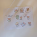 Sticker sheet with cartoon bears and text on a light background.