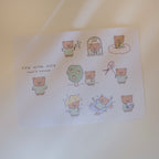 Sticker sheet with cartoon bears and text on a light background.