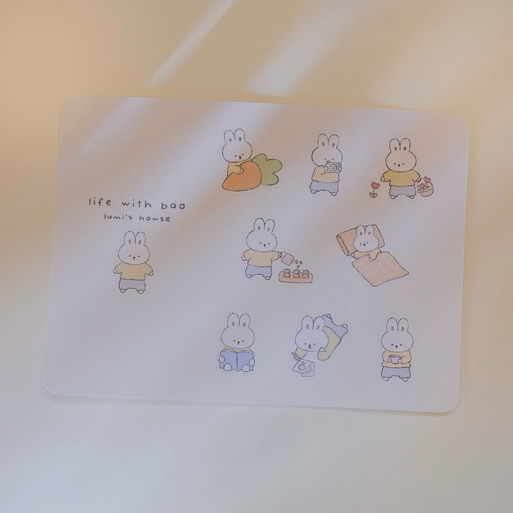 Sticker sheet with cartoon bunnies and text on a light background.