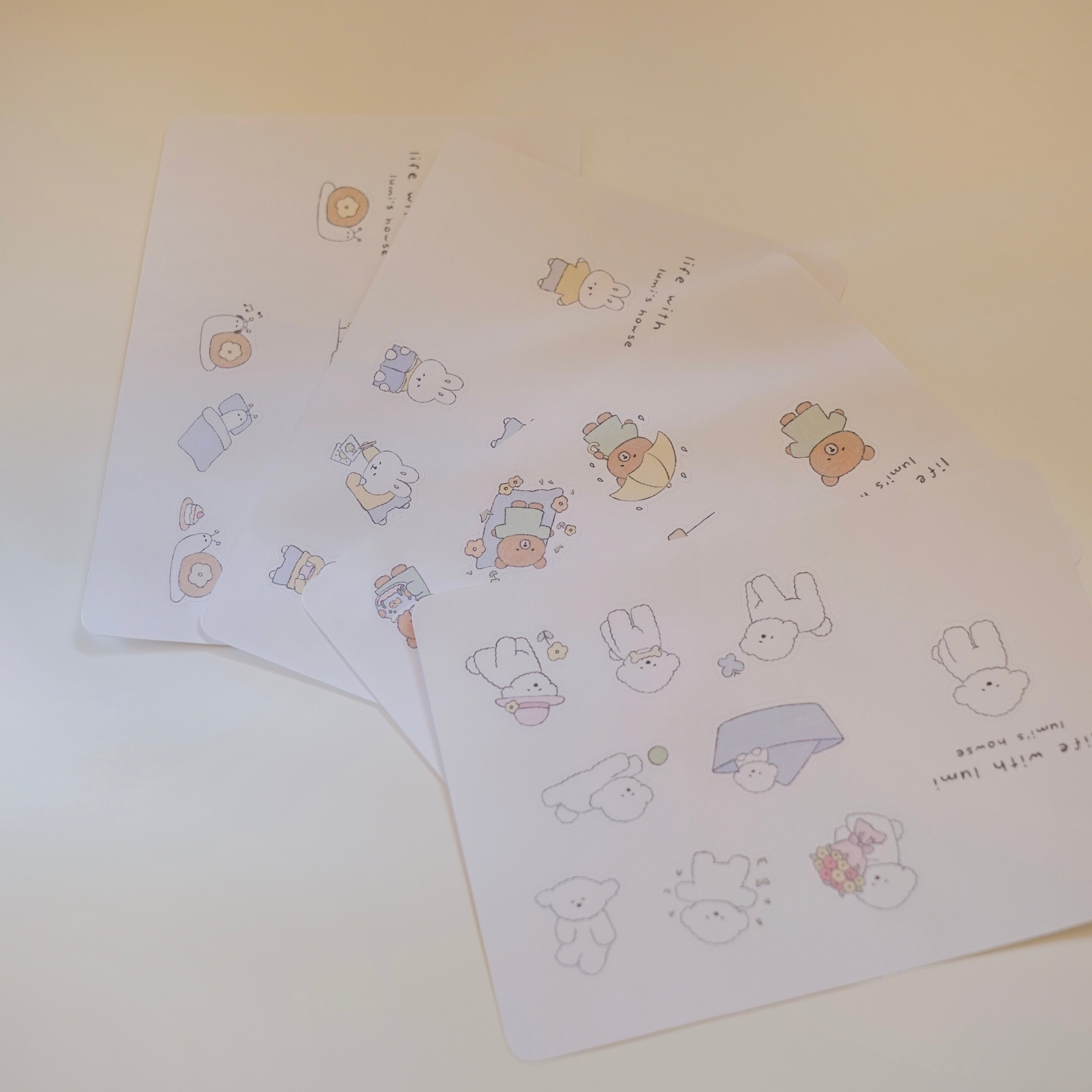 Four sheets of stickers with cute animal illustrations on a light background.