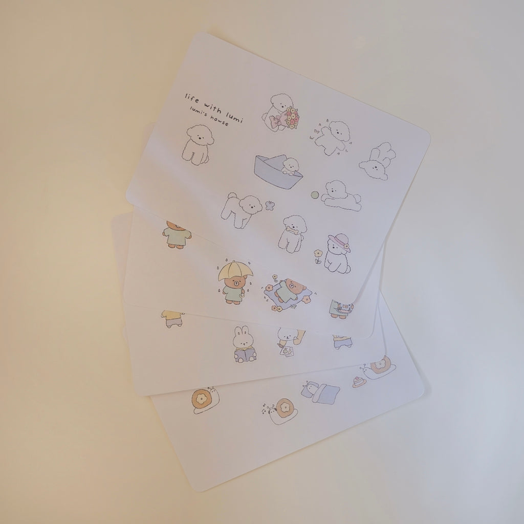 Set of illustrated sticker sheet with cute animal designs on a light background.